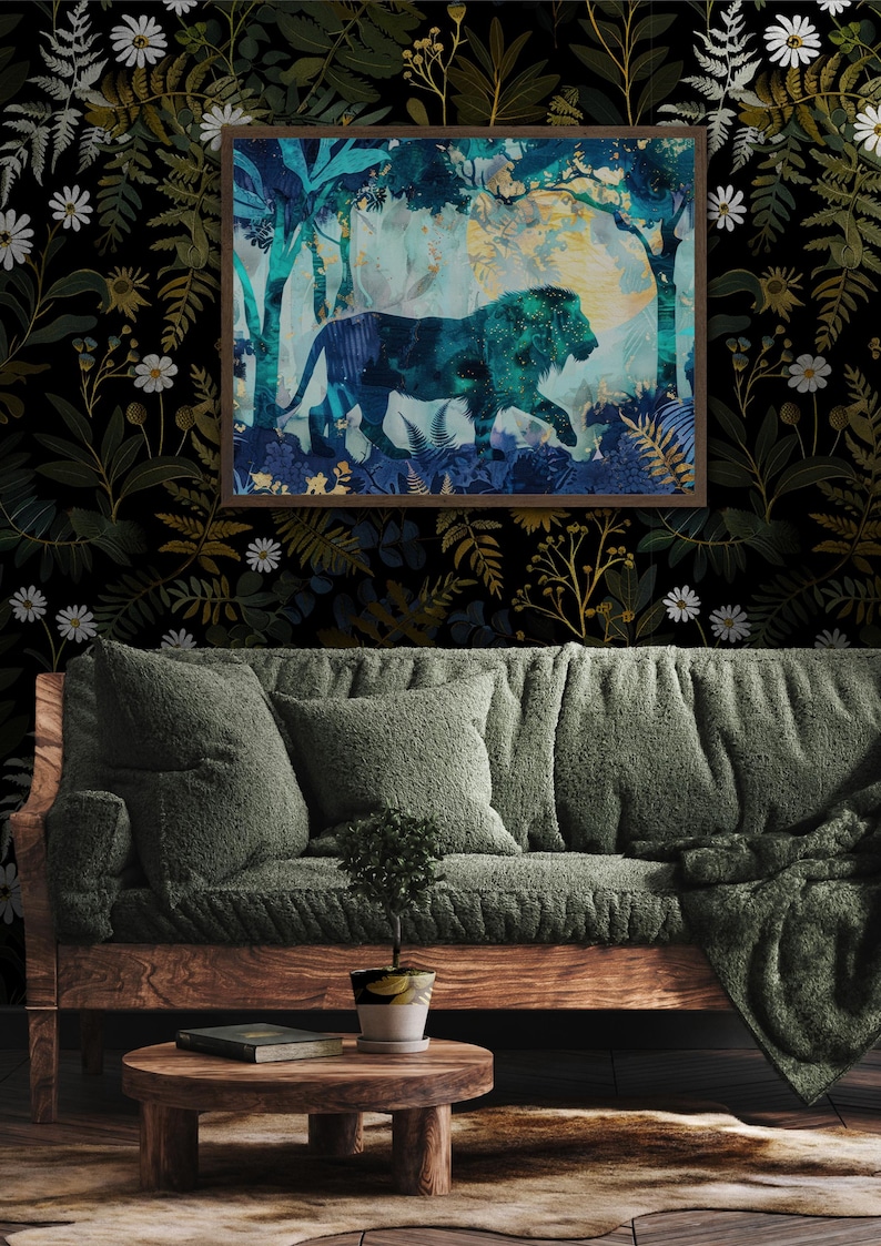 May include: A framed art print featuring a lion silhouette in a teal and blue forest scene. The artwork hangs above a green sofa with matching pillows and a wooden coffee table. The background is a dark floral wallpaper.