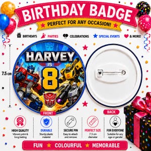 May include: A circular birthday badge measuring 7.5 cm in diameter featuring a Transformers graphic with the text 'HARVEY IS 8'. The front displays Optimus Prime, Bumblebee, and Megatron, while the white back shows a metal pin fastener.
