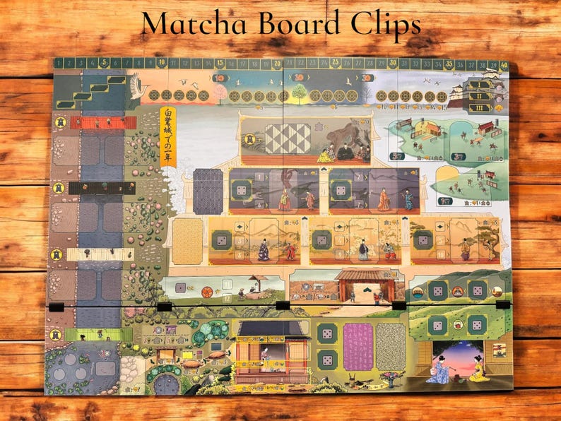 May include: A colorful game board with Japanese-inspired illustrations and text. The board is divided into sections with different scenes, including a garden, a house, and a street. The board is made of cardboard and has a matte finish.