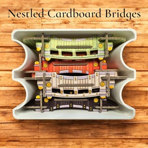 May include: Four cardboard bridges, each with a different color and design, are stacked inside a white container. The bridges are green, red, white, and black.