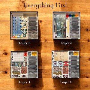 May include: Four layers of a board game organizer, showing how all the game components fit inside. The organizer is made of white plastic with black dividers. The game components include cards, tokens, and dice. The organizer is labeled "Layer 1", "Layer 2", "Layer 3", and "Layer 4".