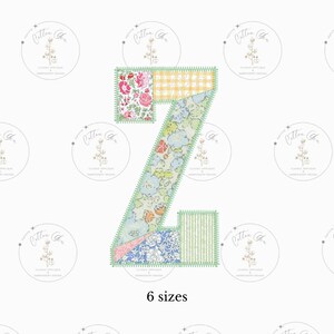 May include: A patchwork style letter Z in six sizes. The letter is made of different floral and patterned fabrics in shades of pink, blue, green, and yellow. The letter is outlined in green.