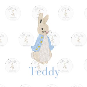 May include: Embroidered design of a white rabbit wearing a blue jacket with yellow buttons. The rabbit is standing on a white background with the name "Teddy" written below it.