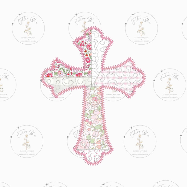 May include: A pink patchwork cross with a floral design. The cross is outlined in pink stitching and has a scalloped edge.