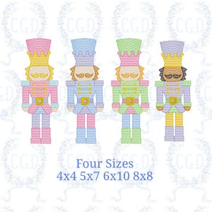 May include: Four colorful nutcracker designs in pink, blue, green, and yellow. Each nutcracker has a detailed uniform with a gold belt buckle and a crown. The text "Four Sizes" and the sizes 4x4, 5x7, 6x10, and 8x8 are below the nutcrackers.