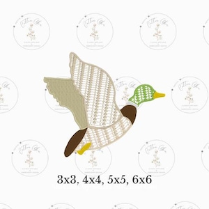 May include: An embroidered design of a flying duck in shades of brown, tan, green, and yellow. The duck is in mid-flight with its wings spread. Text at the bottom reads "3x3, 4x4, 5x5, 6x6".