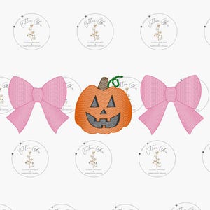 May include: Embroidered design featuring a smiling jack-o'-lantern with a green stem and two pink bows. The pumpkin is orange with a black face. The bows are a solid pink color. The design is repeated across a white background.