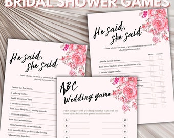 May include: Printable bridal shower games on cream-colored paper. The games include "He Said, She Said" and "ABC Wedding Game", each decorated with pink floral accents. The text is in a handwritten style font.
