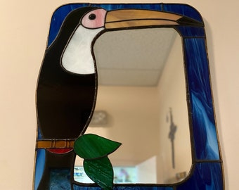 Toucan mirror in stained glass