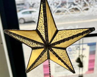 Adorno de estrella de cristal ámbar