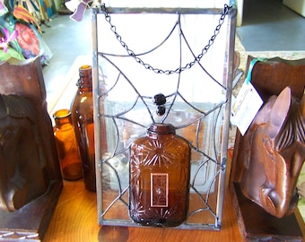 Telaraña: Arte en botellas