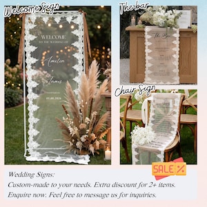 May include: Clear acrylic wedding signs with white lace trim. The signs include a welcome sign, bar menu, and chair sign. The welcome sign displays the names Amelia and James, and the wedding date. The bar sign lists signature drinks.