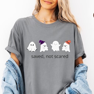 Saved not scared christian shirt, christian halloween, halloween shirt, ghost shirt, fall season tee, christian apparel,religious shirt