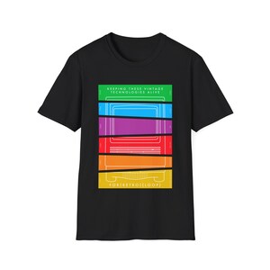 May include: Black t-shirt featuring a rainbow coloured graphic of a vintage computer. The text "KEEPING THESE VINTAGE TECHNOLOGIES ALIVE" and "FOR[RETRO]LOOP" is printed on the shirt.