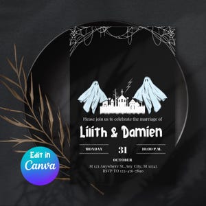 May include: Black Halloween wedding invitation with white cobwebs, two light blue ghosts, and a silhouette of a town. The invitation reads "Lilith & Damien" and includes the date, time, and RSVP information.