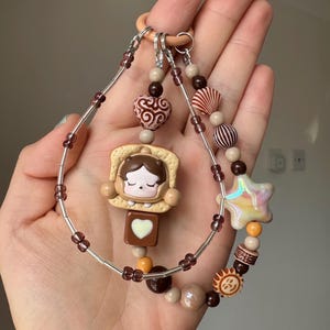 Popmart Authentic Skullpanda Bread Pop Bean Beaded Phone Strap and Bag Charm in Brown with Excellent Quality Beads