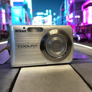 Broken Nikon Coolpix S210: Vintage Digital Camera (For Parts/Repair Only)