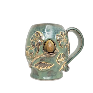 Gorgeous Tiger&#39;s Eye Egg in Turquoise Crystal Mug Handmade Ceramic Sculpted Floral Detailing Gardeners Gift Gold Text Nurture and Bloom