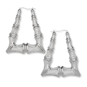 May include: A pair of large silver hoop earrings with a bamboo design. The earrings are made of metal and have a shiny finish.