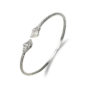 May include: A silver bangle bracelet with a textured finish and two leaf-shaped accents at the opening.