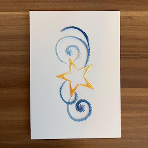 Carta con ricamo stella cadente
