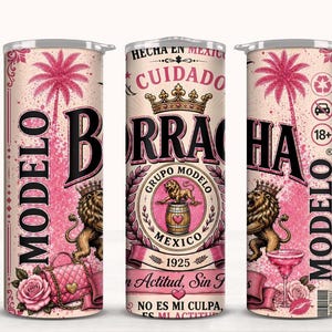 May include: Three cylindrical tumblers featuring a pink and cream color scheme with palm tree graphics, a crown, a lion, and a handbag. The text includes "MODELO", "BORRACHA", "HECHA EN MEXICO", "GRUPO MODELO", "1925", and "NO ES MI CULPA".