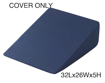 May include: A blue wedge pillow cover, 32 inches long, 26 inches wide, and 5 inches high.  The cover is labeled "COVER ONLY".