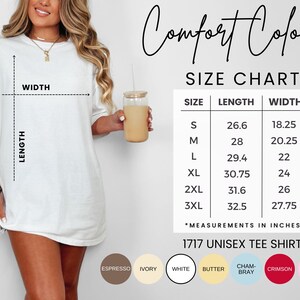 May include: White unisex tee shirt with a size chart. The chart shows measurements in inches for sizes S to 3XL. The shirt is labeled "1717 Unisex Tee Shirt" and has color options including Espresso, Ivory, White, Butter, and Crimson.