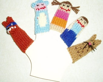 May include: Five knitted finger puppets, including a brown bear, a blue and white monkey, a brown and pink cat, and two girls with pink and orange dresses.