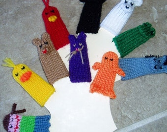 May include: A set of ten finger puppets, each with a different animal design. The puppets are made of knitted yarn in various colors, including red, blue, green, orange, yellow, brown, and white. The puppets are all about 4 inches tall and have a finger hole at the bottom.
