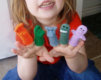 Dinosaur Finger Puppet Set (Includes 5 different dinosaurs.)  We can create custom orders of individual puppets or sets.