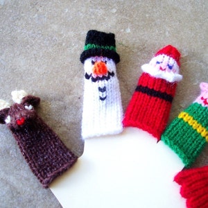 Christmas Finger Puppet Set (Santa, Mrs. Santa, Rudloph, Snowman, and Elf.)  We can create custom orders.