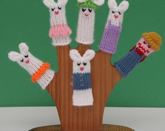 Peter Rabbit Finger Puppet Set  (Includes Peter Rabbit, Flopsy, Mopsy, Cottontail, Mama Rabbit, and Farmer McGregor.)