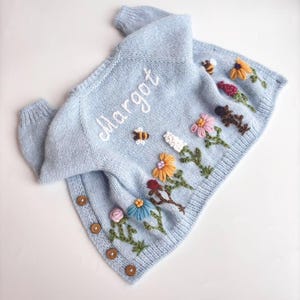 Personalized cardigan with baby girl name. Custom handmade knitted soft sweater with embroidery flowers for toddlers kids. Gift 1st birthday