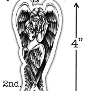 May include: A black and white sticker featuring an angel with outstretched wings, covering her face. The sticker is 4 inches (10 cm) tall and 2 inches (5 cm) wide. The word "2nd." is printed at the bottom.