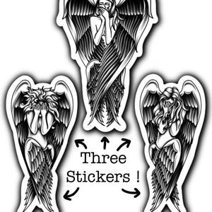 May include: Three stickers featuring black and white illustrations of angels with large feathered wings. The angels are depicted with their hands covering their faces. The text "Three Stickers !" is also included.