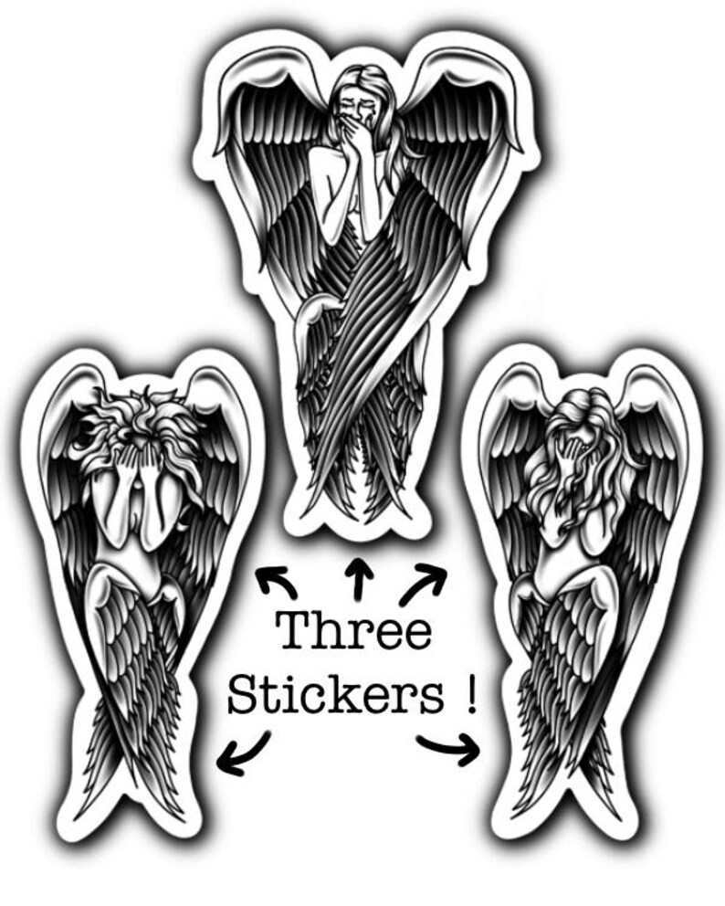 May include: Three stickers featuring black and white illustrations of angels with large feathered wings. The angels are depicted with their hands covering their faces. The text "Three Stickers !" is also included.