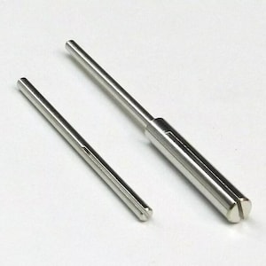 May include: Two silver metal rods with a split end. The longer rod is about 6 inches long and the shorter rod is about 4 inches long.