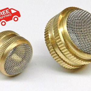 May include: Two brass hose nozzles with mesh screens. The nozzles have a gold finish and a ridged design for grip. The mesh screen is silver. The image also includes a red graphic of a truck with the words "FREE SHIPPING".