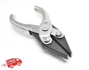 May include: A silver and black automotive tool, possibly pliers, with a curved handle and a pointed, angled head. The tool has a series of numbers etched on the handle. The tool is on a white background.