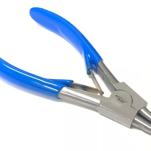 May include: Blue handled pliers with a silver metal body and two pointed tips. The pliers are designed for jewelry making.