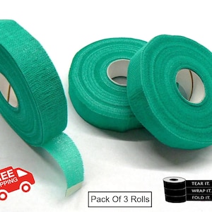 May include: Three rolls of teal green hook and loop tape. The tape is rolled up and ready to use. The text on the image reads "Tear it, Wrap it, Fold it".