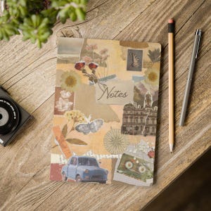 May include: A vintage-style notebook with a collage of images including a butterfly, a car, flowers, and a building. The notebook cover is brown with a cream-colored paper overlay. The word "Notes" is written in cursive on the cover.