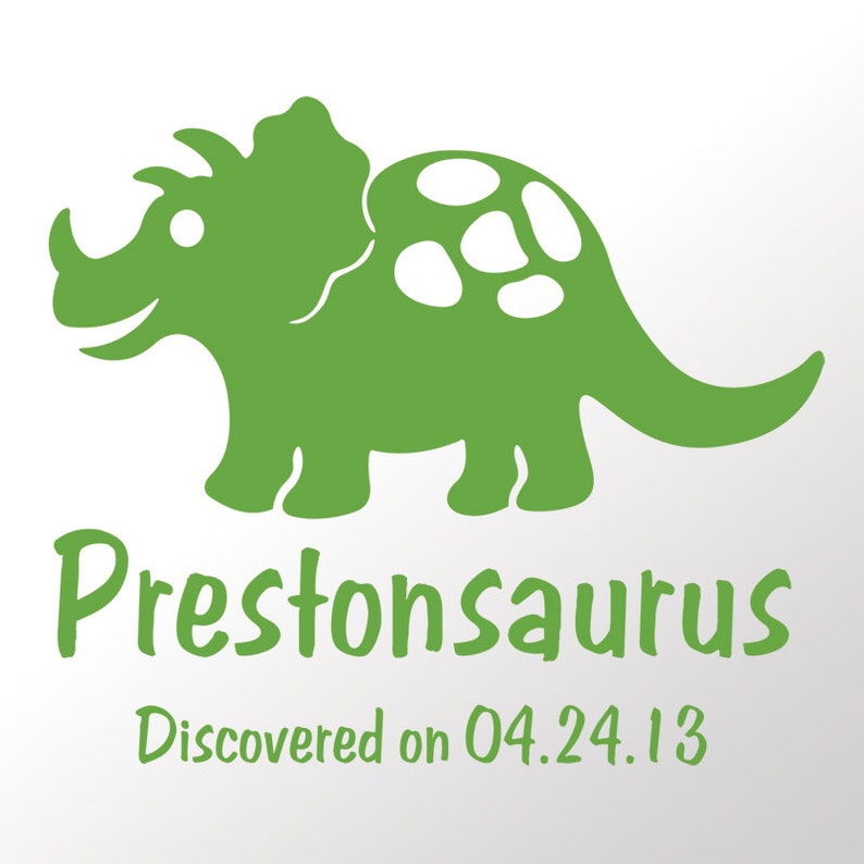 May include: A green cartoon triceratops with white spots, the text "Prestonsaurus" and "Discovered on 04.24.13" below.