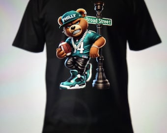 Rep your squad with swagger! The NFL Hip-Hop Bear Apparel brings bold style to game day—where fandom meets streetwear. #BearStyle
