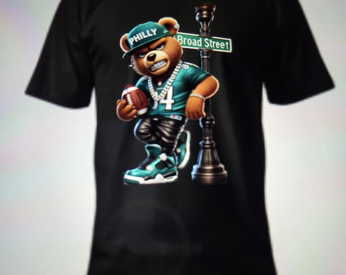 Rep your squad with swagger! The NFL Hip-Hop Bear Apparel brings bold style to game day—where fandom meets streetwear. #BearStyle