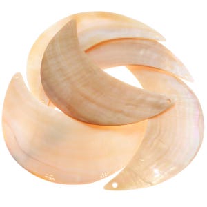 May include: A white ceramic mug with a black handle and the text "But First, Coffee" in a black, handwritten-style font. The mug is on a white surface.