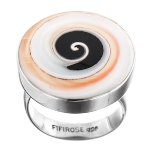 May include: A silver ring with a large, round, spiral-patterned face. The spiral design features a black center, surrounded by white, orange, and tan hues. The ring band is silver and has the text "FIFIROSE 925" engraved on it.