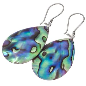 May include: A pair of teardrop-shaped earrings with iridescent abalone shells. The earrings feature a silver hook design. The abalone shells display a mix of blue, green, and purple hues, creating a shimmering effect. The earrings are set against a white background.