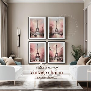 May include: Set of four framed prints featuring watercolor paintings of the Eiffel Tower in Paris, France. Each print depicts the tower with pink blossoms and a vintage car in the foreground. The prints are arranged in a grid pattern on a wall.